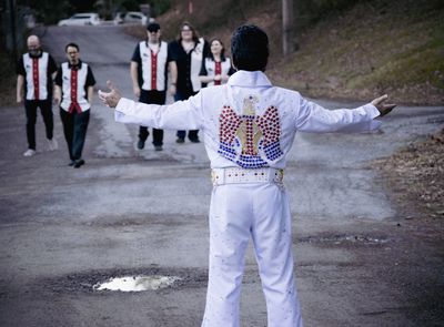 Elvis greeting the Outlaws on their return